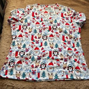 EUC scrub top Christmas theme